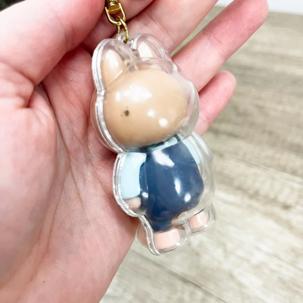 Labubu Monster Art Toy Keychain Blue Overalls Clear Protective Case Gold Tone